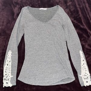 T Party Lpng Sleeved shirt with cute embellishments on the sleeves - Size Medium